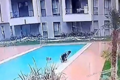 Kurye, teslimat için gittiği sitede havuza düştü