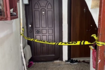 Eşini çocuklarının gözü önünde öldürdü