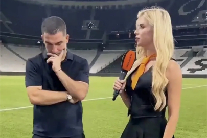 Arda Turan'ın güzel muhabirle göz teması kurmama çabası dikkat çekti