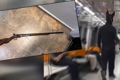 Üstünde tavşan kostümü, elinde tüfek...