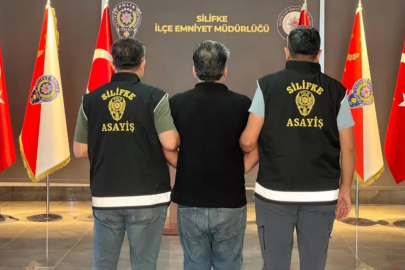 Mersin'de 31 yıl hapis cezasıyla aranan dolandırıcı yakalandı