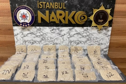 Baza altındaki valizden binlerce uyuşturucu hap çıktı