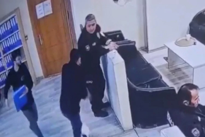 Polis merkezinde bir şahıs bekçiye saldırarak silahını almaya çalıştı