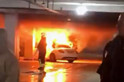 Otomobil otoparkta alev aldı