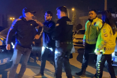 Bursa'da trafik denetiminde ilginç anlar: Baba kaputa oturup direndi!