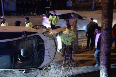 Bursa'da korkutan kaza! Otomobil yan yattı