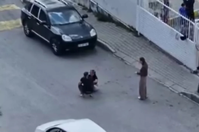 Sokak ortasında karısını dövdü, okuldaki çocuklar izledi!