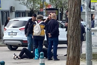 Bursa'da otomobil ile çarpışan motosikletin sürücüsü yere düşerek yaralandı