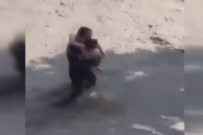 Azerbaycan'da nehre düşen çocuğu polis kurtardı, dede hayatını kaybetti